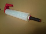 Hand-saver palletwrap dispenser</br>Simple stretchwrap clutched applicator